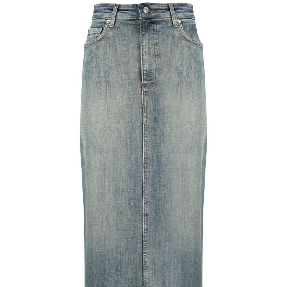 This skirt from GANNI , mid-wash denim with a faded effect.,size 36.